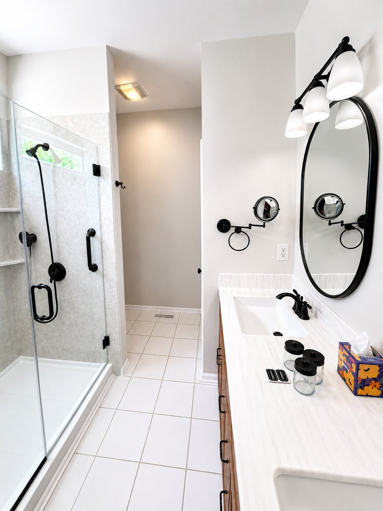 Bathroom vanity and walk-in shower shining after a deep clean