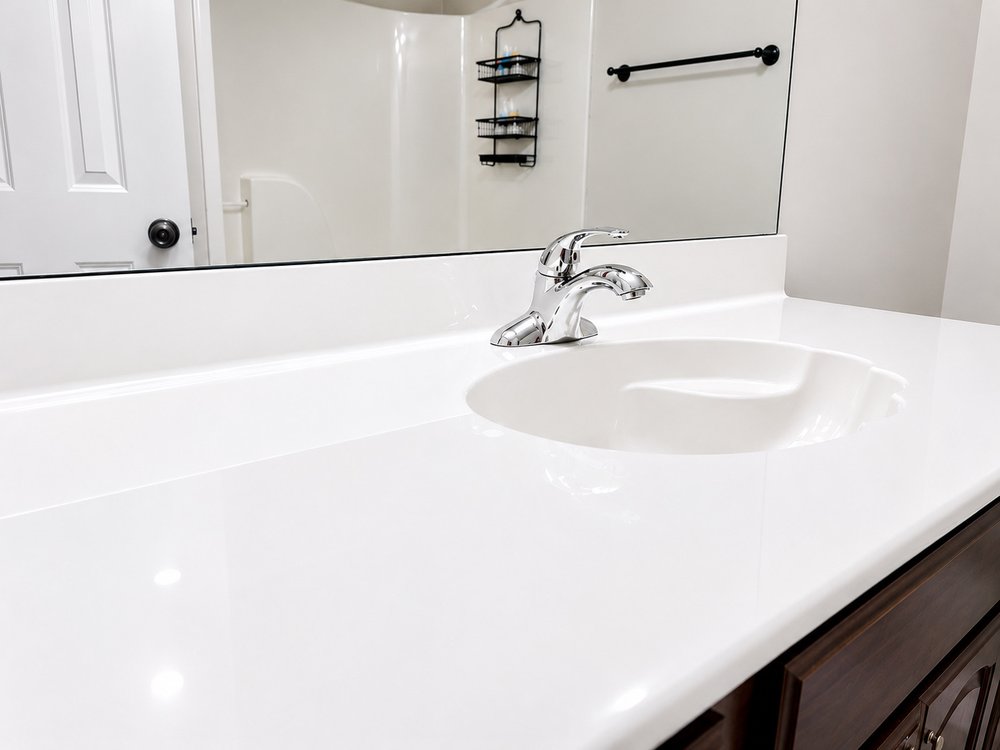 Bathroom sink and countertop polished to a spotless finish